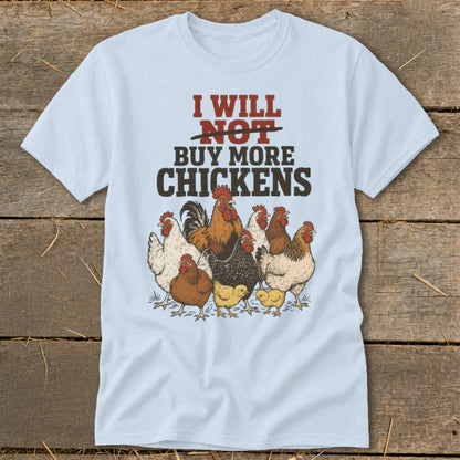 Light blue t-shirt with text "I WILL NOT BUY MORE CHICKENS" and illustrations of chickens.