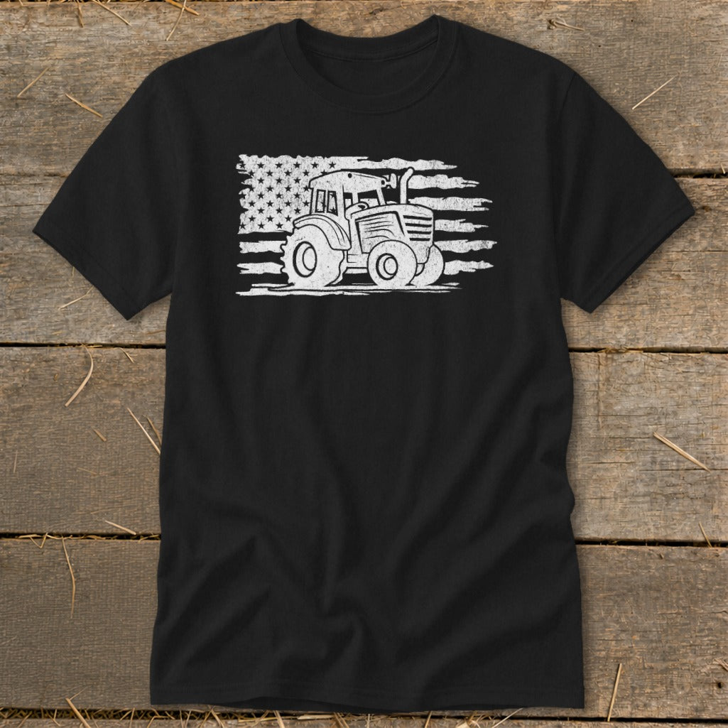 Black t-shirt with white graphic of a tractor superimposed on an American flag.