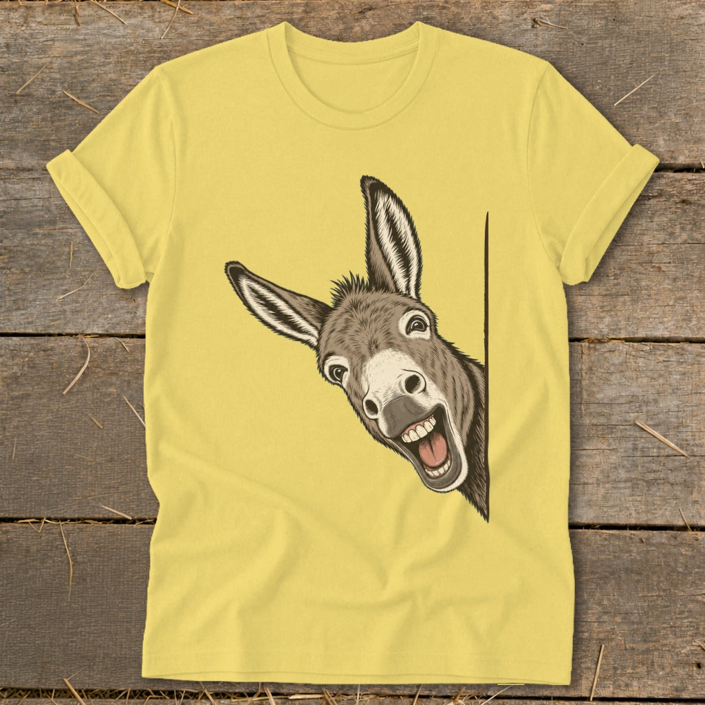 Yellow t-shirt with a drawing of a smiling donkey peeking from the side.