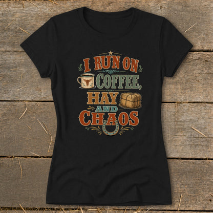 Black t-shirt with text "I run on coffee, hay and chaos" and illustrations.