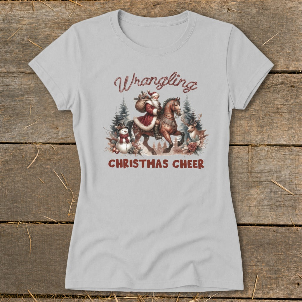 Light grey t-shirt with Santa on horseback and text "Wrangling Christmas Cheer".