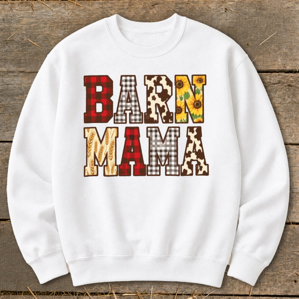 White sweatshirt with "BARN MAMA" text in patterned letters.