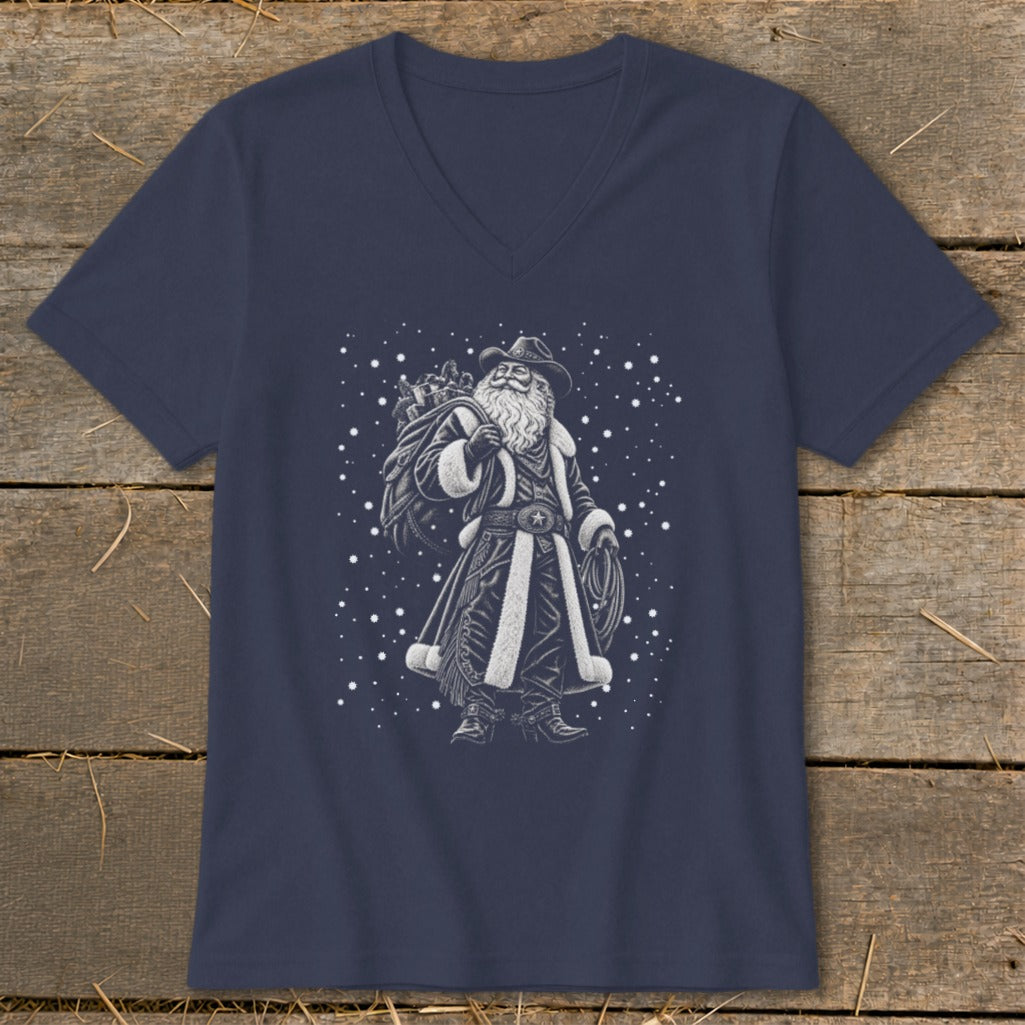 Santa Claus wearing a cowboy hat and holding a lasso and sack of gifts.