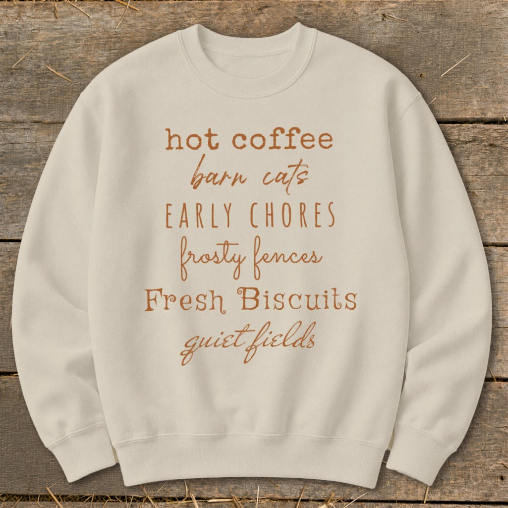 Cream sweatshirt with text: "hot coffee, barn cats, early chores, frosty fences, Fresh Biscuits, quiet fields".