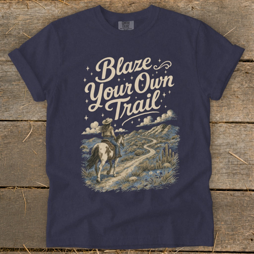 Navy t-shirt with "Blaze Your Own Trail" text and a cowboy riding a horse.