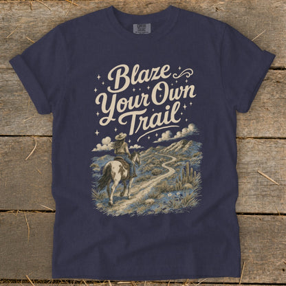 Navy t-shirt with "Blaze Your Own Trail" text and a cowboy riding a horse.