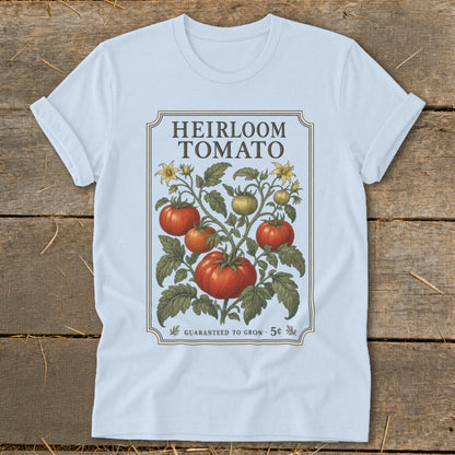 Light blue t-shirt with an "Heirloom Tomato" graphic and a vintage tomato plant illustration.