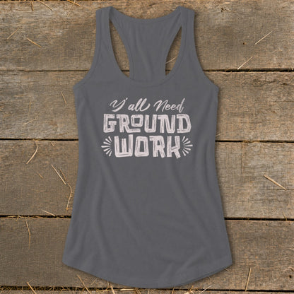 Grey racerback tank top with "Y'all Need GROUND WORK" text and starbursts.