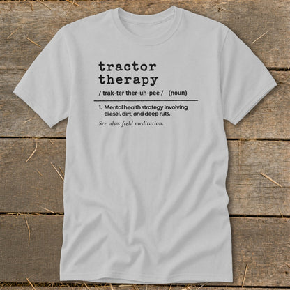 Light gray t-shirt with "tractor therapy" definition printed on it.