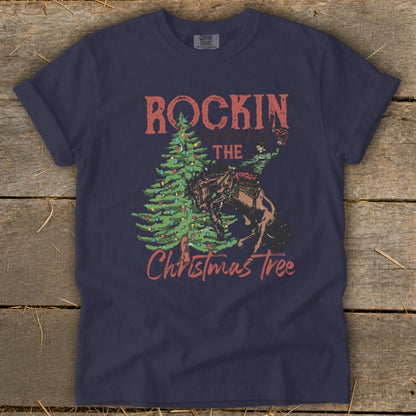 Navy t-shirt with "Rockin the Christmas Tree" graphic featuring a cowboy on a bucking horse.