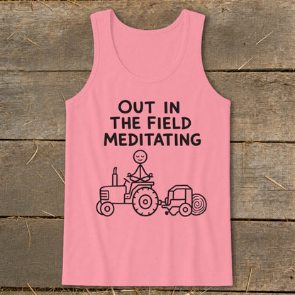 Pink tank top with "Out in the Field Meditating" text and a stick figure meditating on a tractor.