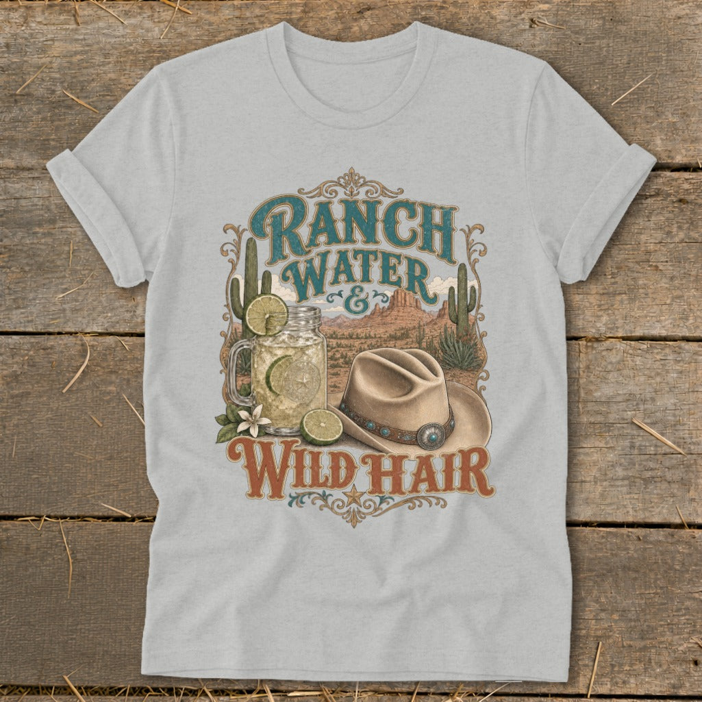 T-shirt graphic with "Ranch Water & Wild Hair" text, desert scene, drink, and hat.