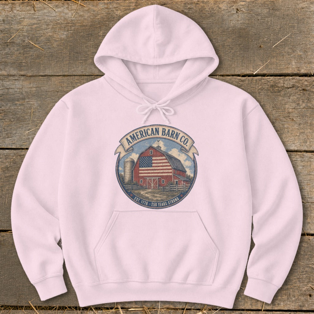 Pink hoodie with American Barn Co. emblem featuring a barn and American flag.