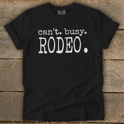 Black t-shirt with white text "can't. busy. RODEO."