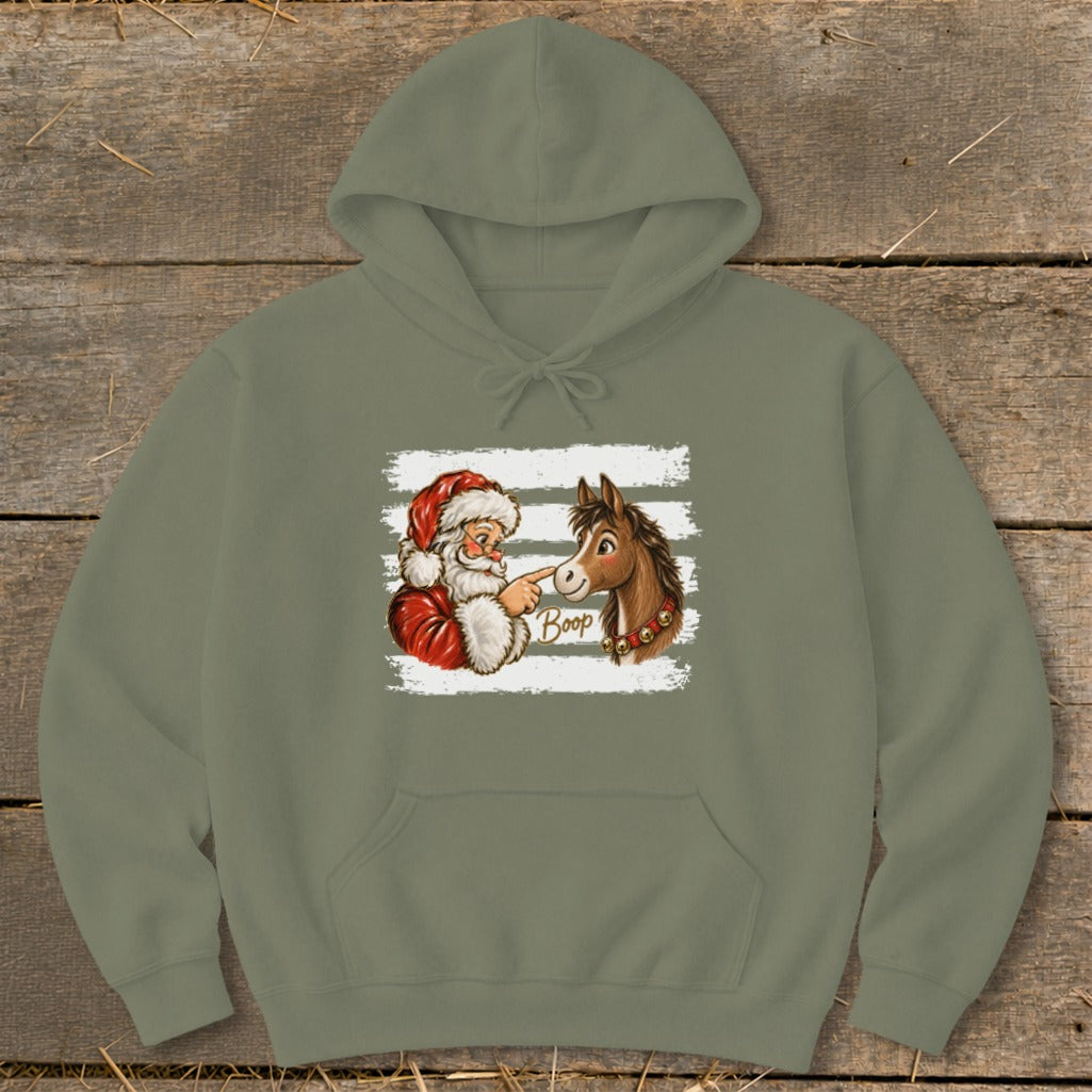 Santa boops a horse's nose with the word "Boop" on a graphic.