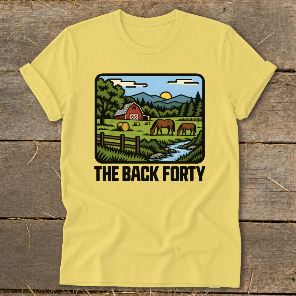 Yellow t-shirt featuring a farm graphic with horses, a red barn, and the text The Back Forty.