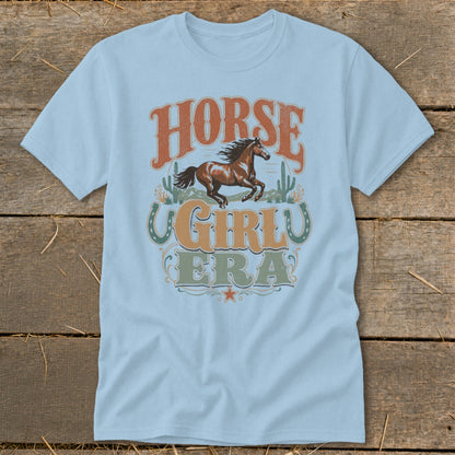 Light blue t-shirt with "HORSE GIRL ERA" text and a running horse graphic.
