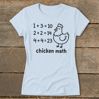 Light blue t-shirt with black text and a cartoon chicken saying "chicken math."