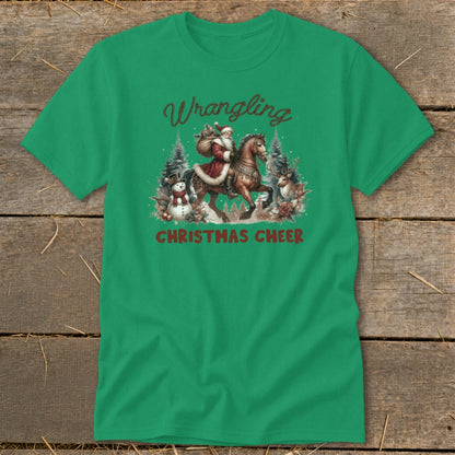 Green t-shirt with Santa on horseback, snowman, and deer, saying "Wrangling Christmas Cheer".