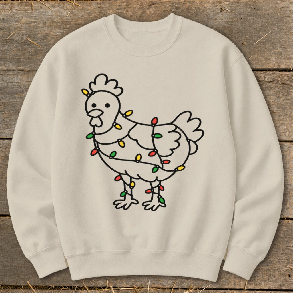 Cream sweatshirt with a black line drawing of a chicken wrapped in colorful Christmas lights.