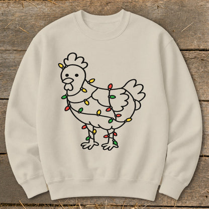 Cream sweatshirt with a black line drawing of a chicken wrapped in colorful Christmas lights.