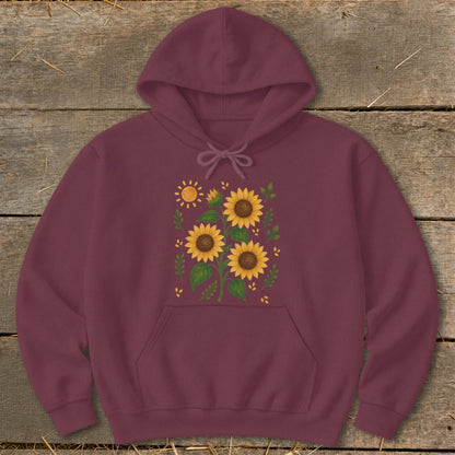 Maroon hoodie with a sunflower and sun graphic on the chest.