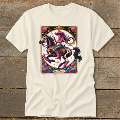 T-shirt graphic of a skeleton cowgirl riding a horse, with text "The Cowgirl".