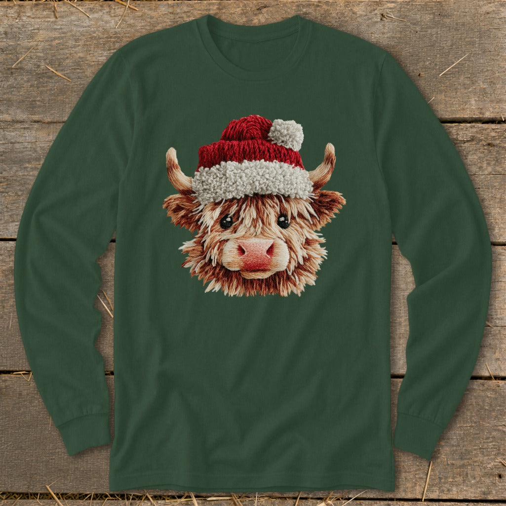Long-sleeve dark green t-shirt with a Highland cow wearing a Santa hat graphic.
