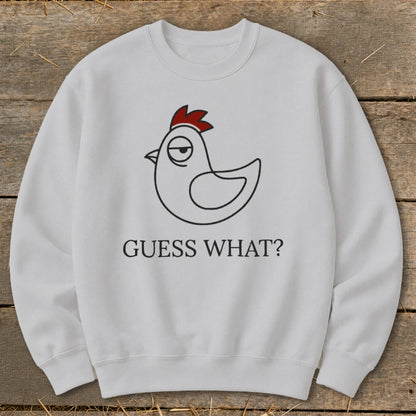 White sweatshirt with a cartoon chicken and "GUESS WHAT?" text.