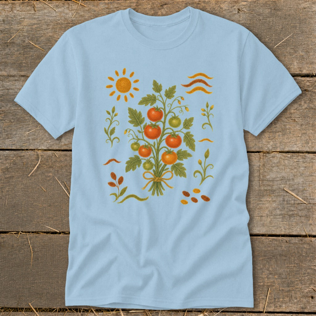 Light blue t-shirt with a stylized tomato plant illustration, sun, and wavy lines.