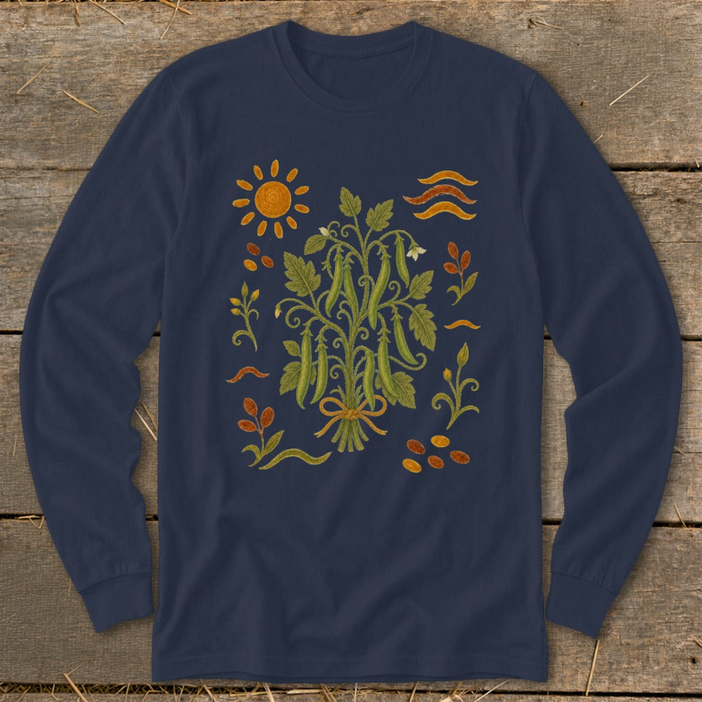 Navy long-sleeve shirt with a folk art illustration of pea pods and sun.