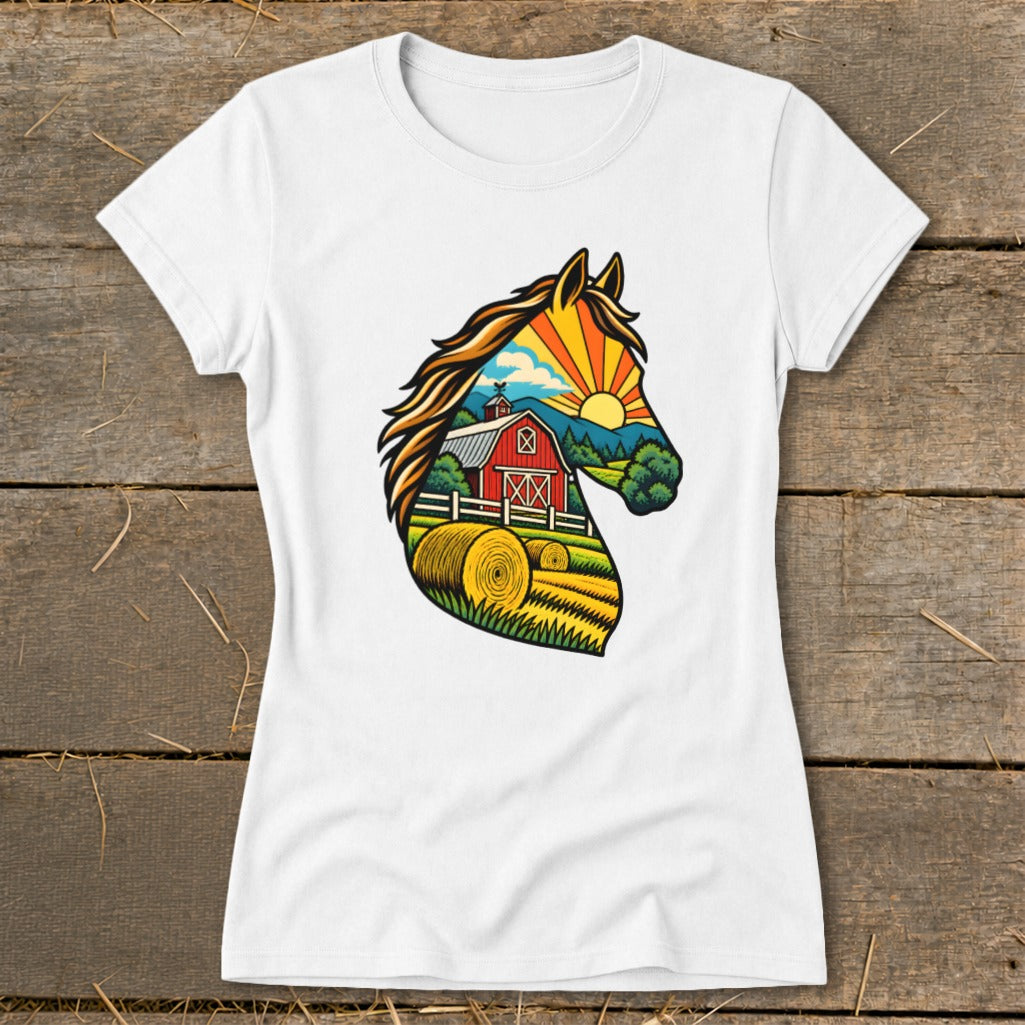 A white t-shirt featuring a colorful illustration of a horse head filled with a farm landscape.