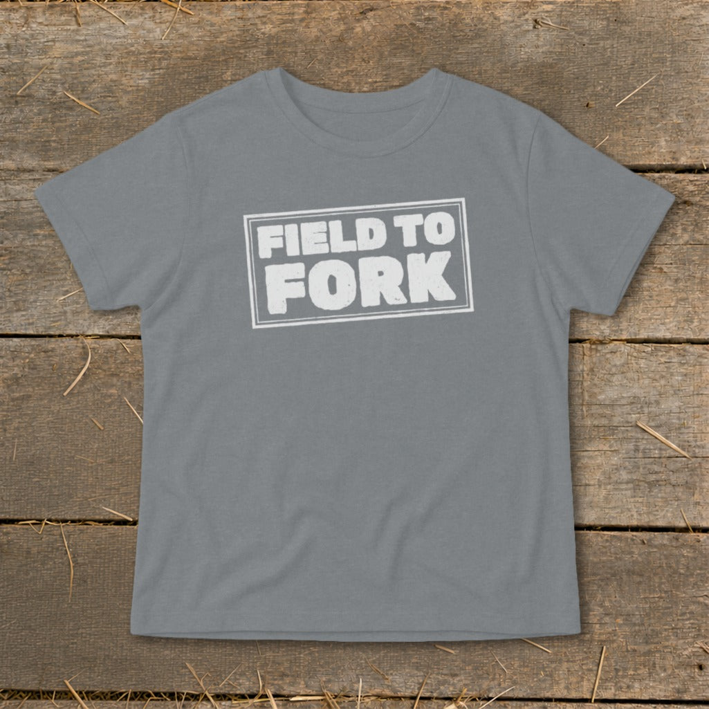 A gray short-sleeve t-shirt with a white stamped box graphic reading FIELD TO FORK.