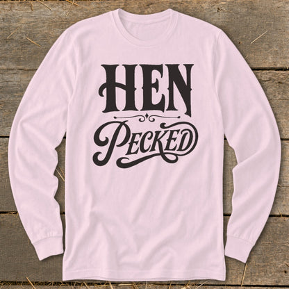 Pink long-sleeve shirt with black "HEN PECKED" text in decorative font.