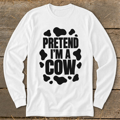 White long-sleeve shirt with black "Pretend I'm a Cow" text and spots.