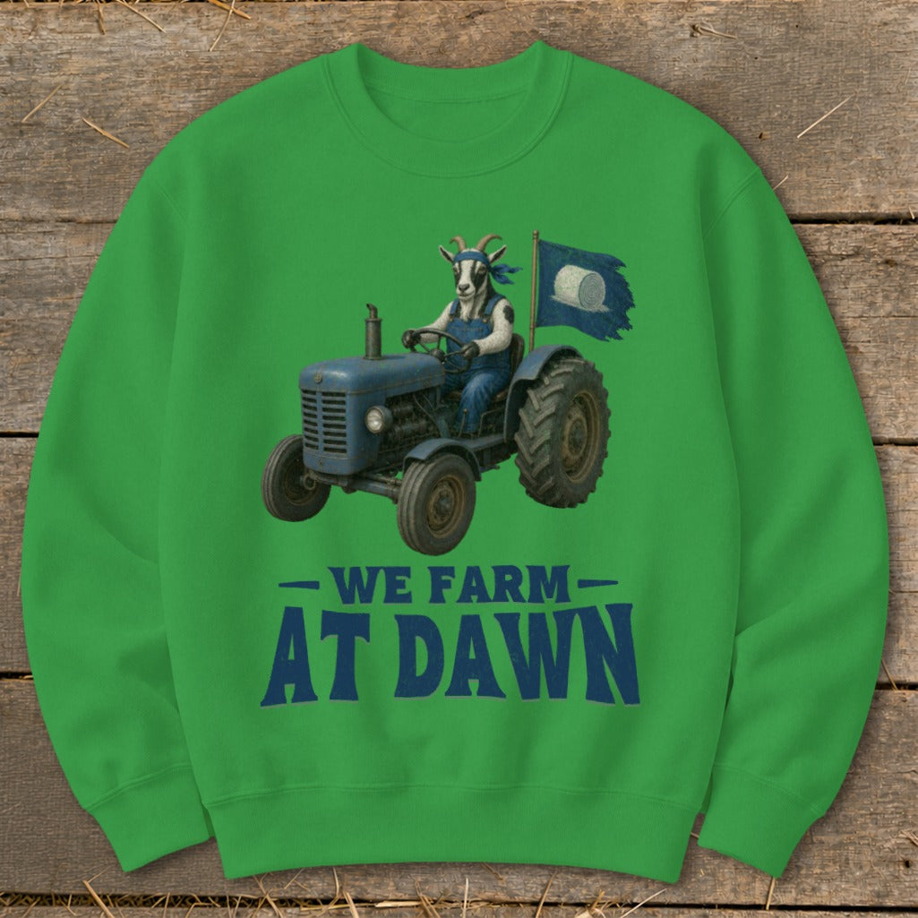 Goat in overalls driving a blue tractor with a flag, "WE FARM AT DAWN" text.