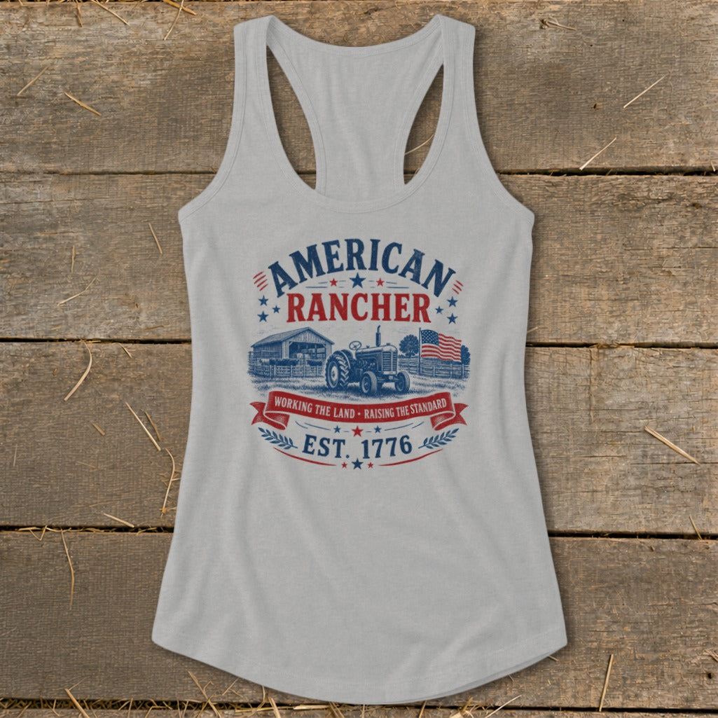 American Rancher graphic on a light grey tank top with tractor, barn, and flag.
