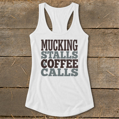 White racerback tank top with text "Mucking Stalls & Coffee Calls".