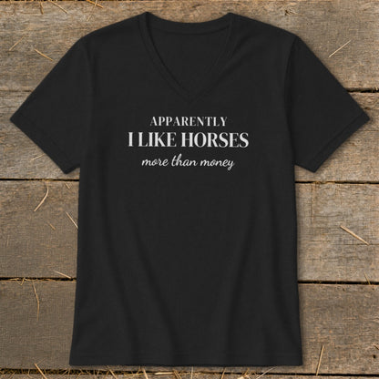 Black v-neck t-shirt with "Apparently I Like Horses More Than Money" text.