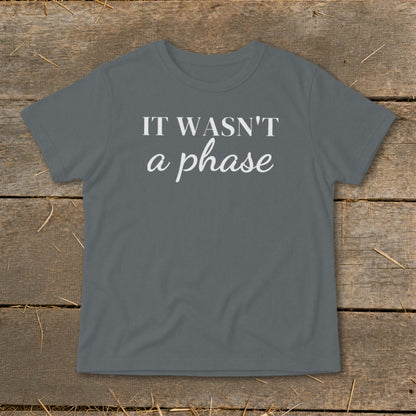 Grey t-shirt with white text reading "IT WASN'T a phase".