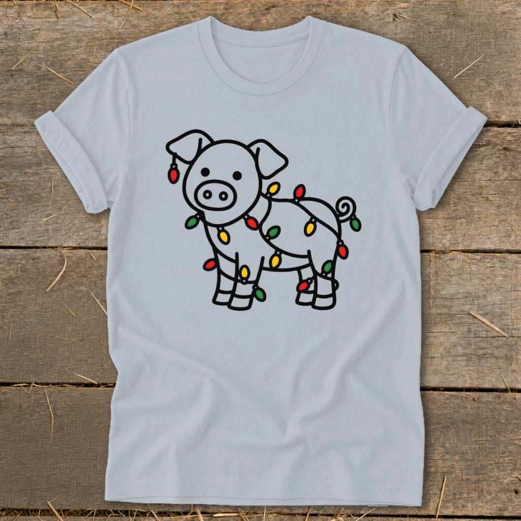 Light gray t-shirt featuring a line drawing of a pig wrapped in colorful Christmas lights.