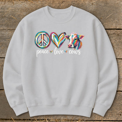 Light gray sweatshirt with a colorful peace sign, heart, and cow graphic and text.