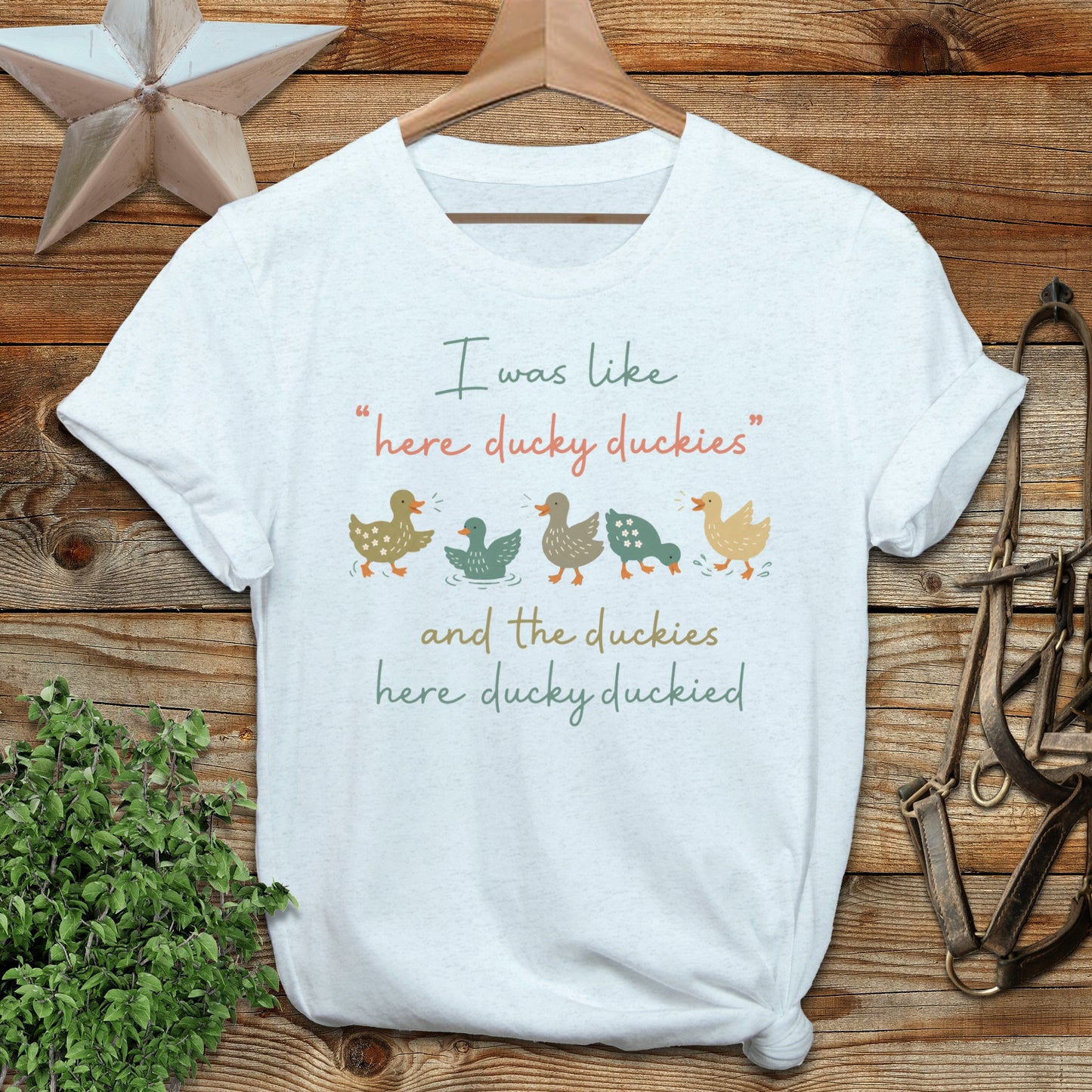 White t-shirt with "I was like here ducky duckies and the duckies here ducky duckied" text.