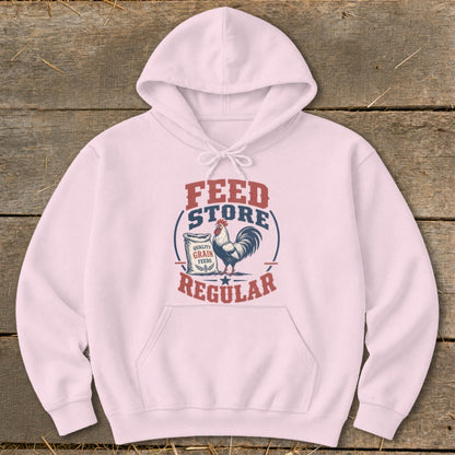 Pink hoodie with "Feed Store Quality Grain Feeds Regular" text and rooster graphic.