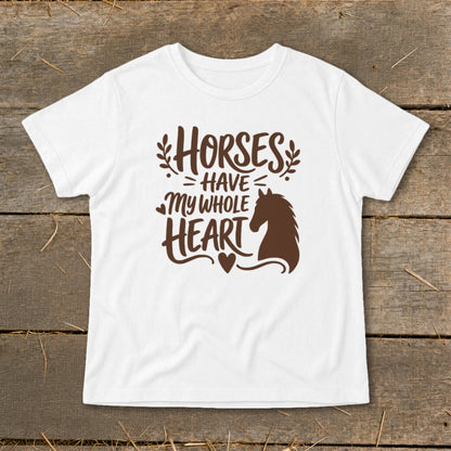 White t-shirt with brown text and horse silhouette saying "Horses Have My Whole Heart".