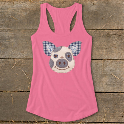 Pink tank top with a pig face applique on the front.