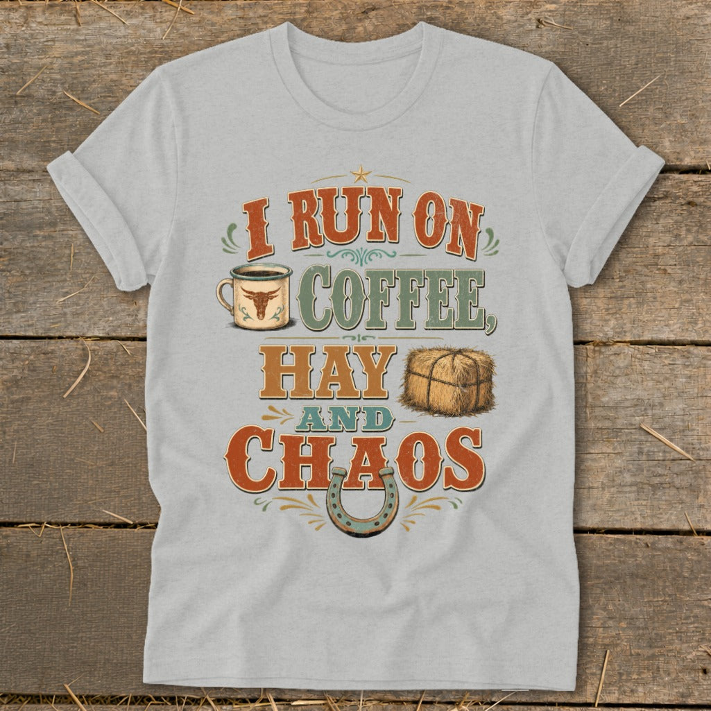 Gray t-shirt with text "I RUN ON COFFEE, HAY AND CHAOS" and western graphics.
