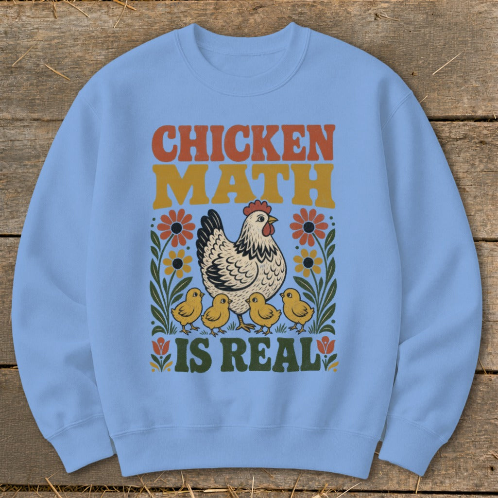Light blue sweatshirt with "Chicken Math Is Real" text and chicken and chicks graphic.