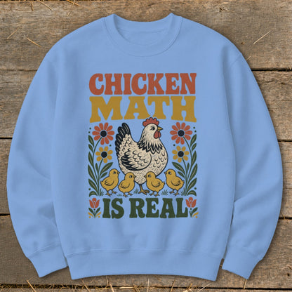 Light blue sweatshirt with "Chicken Math Is Real" text and chicken and chicks graphic.