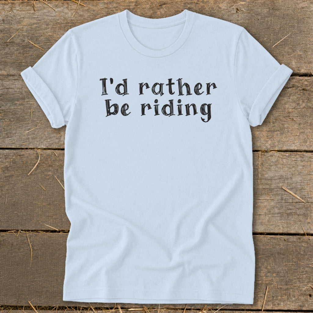 Light blue t-shirt with black text that reads "I'd rather be riding".